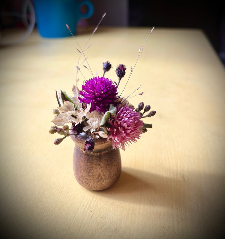 Pink magnet posy on gift box